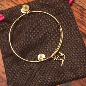 Alex and Ani dove gold color bracelet
